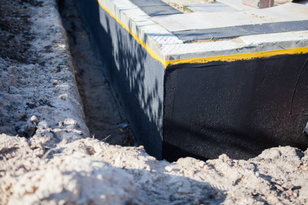 Professional Waterproofing technician working in Highland Park, PA